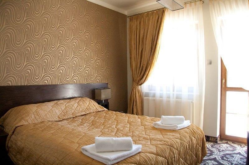 Hotel Sloneczny Brzeg Biskupiec  Esterno foto