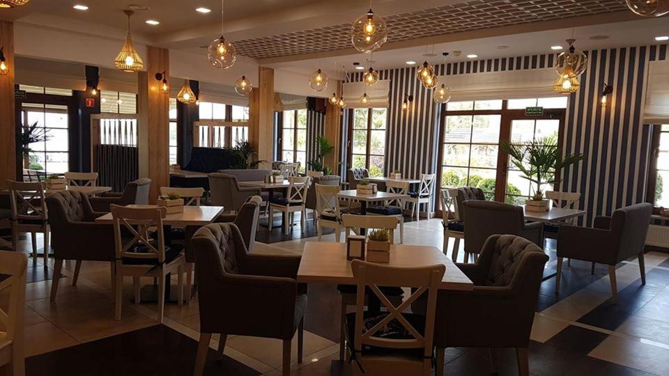 Hotel Sloneczny Brzeg Biskupiec  Esterno foto